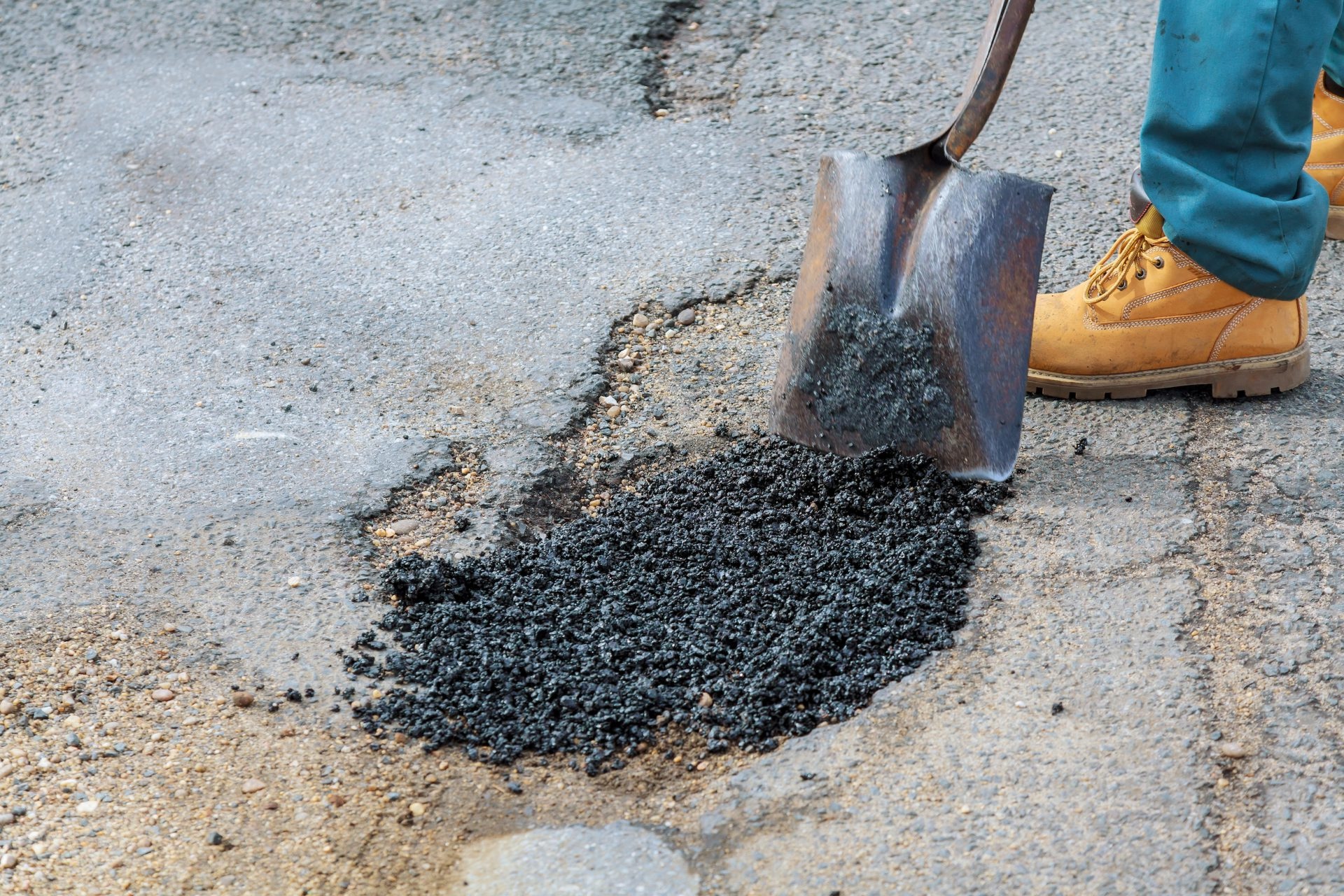 Aquaphalt road repair in progress